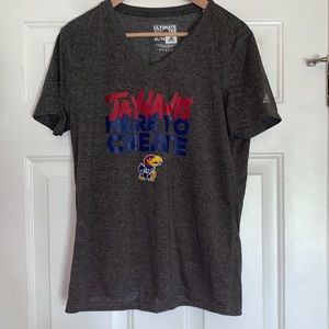 KU Jayhawks shirt.